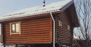 Баня из оцилиндрованного бревна под ключ в зиме - от 136162 рублей